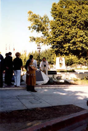 Indian Garden Dedication, Iron Eyes Cody standing behind a rock