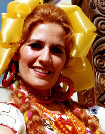 Photograph of a lady with a yellow ribbon in her hair