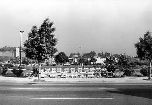 Photograph taken of parking lot number two on Main Street, sectioned off with barricades