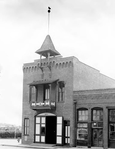 Front facade of the Plaza Firehouse with one door open