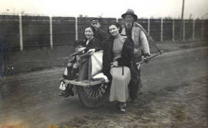 At Woosund, man carrying four others on a cart