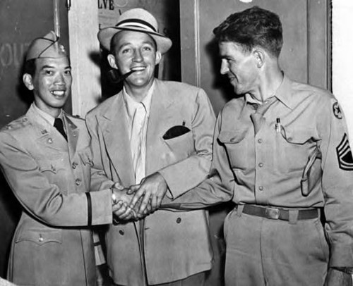 Major Victor Quon with Bing Crosby and a writer