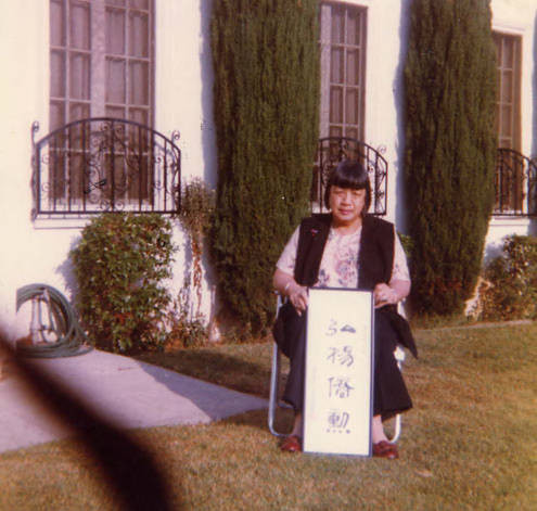 Lily Chan in front of her home in Los Angeles