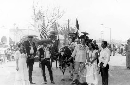 Crowds of people clebrating in the Plaza and on Olvera Street