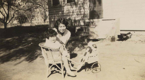 Shirley Ann sitting with a woman in Riverside, California