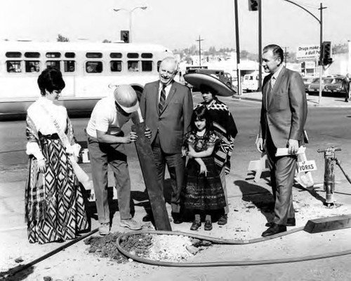 Hilda, Debs and children standing with worker at the Sunset Boulevard closing