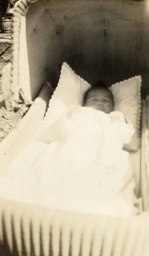 Clifford Yip five weeks old in a carriage