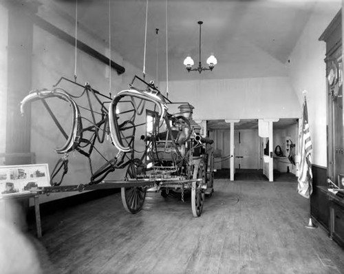 Interior of the Firehouse, with horse drawn fire engine on display