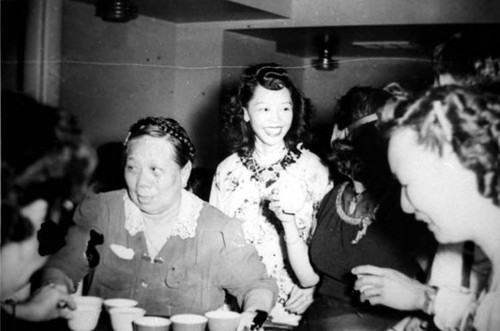 Bride, May Moy, standing with three women