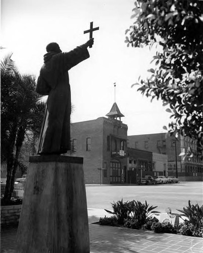 Father Serra statue looking towards Fire House, at Plaza Street and Los Angeles Street intersection