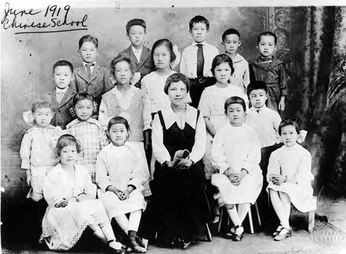 Portrait of a Chinese school class. Jenny Lee (third from left on second row), Mrs. Leong Jeung (center in front) was the teacher