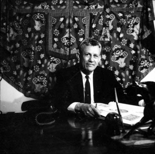 Mario Valadez sitting at a desk