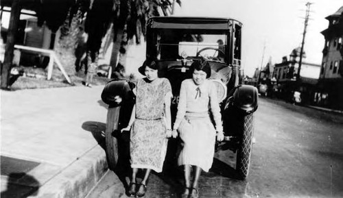 Lillie Soo Hoo and her sister Maimie in front of the Soo Hoo's house on Pico Street