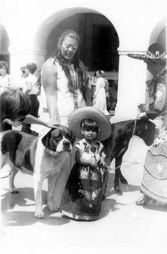 Crowds of people clebrating in the Plaza and on Olvera Street