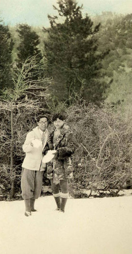 At Forest Home, Phil and Grace Siu hold large pieces of snow