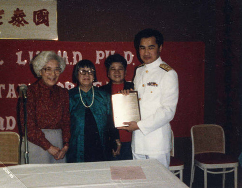 Welcoming Dr. Samuel Lin, the United States Assistant Secretary of Health of the Department of Health and Human Services. Lily Chan stands in the middle