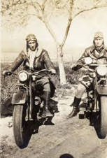 Two men on motocycles