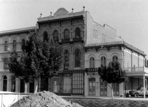 Merced Theater building- photograph of different group and places outside of theater