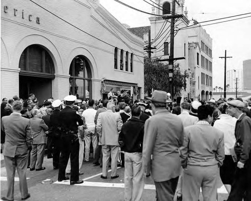 Crowd scene on Sunset listening to the speakers at the Simpson building dedication