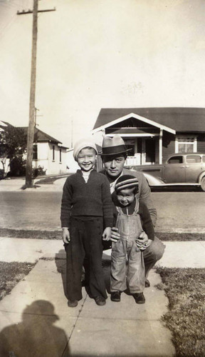 Ronald and Gilbert Siu with their father Jake Siu