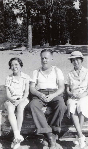 Photo of two women and a man seated. On the back it reads "Zephyr Cove Lake Tahoe '35" (similar to 105-C-1267)