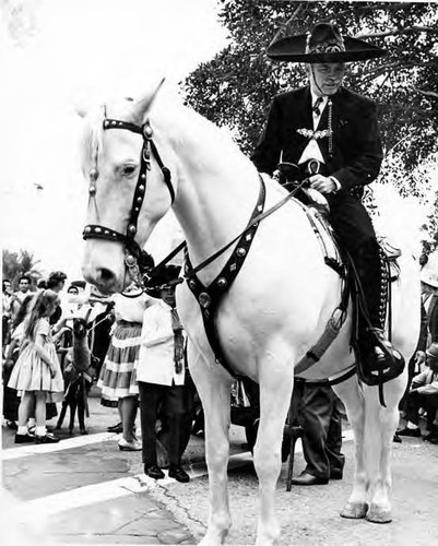 Hernando Courtright on horseback looking down