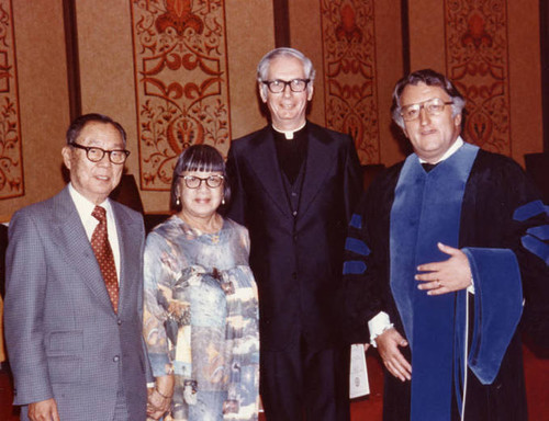 Stanley Chan and Lily Chan with two Catholic members of the clergy