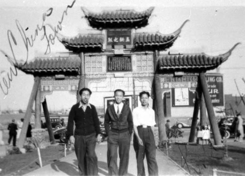 Mr. Louie, Jim Wong and Raymond Chow, in New Chinatown at the North Broadway gate