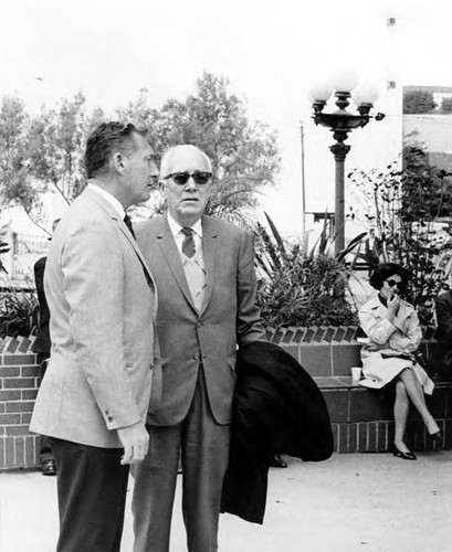 John Anson Ford talking to a man in the Plaza