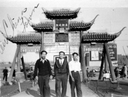 Mr. Louie, Jim Wong and Raymond Chow, in New Chinatown at the North Broadway gate