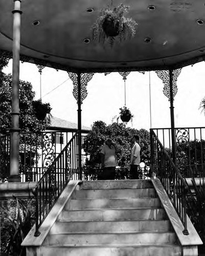 View of kiosko from stairs with two women inside