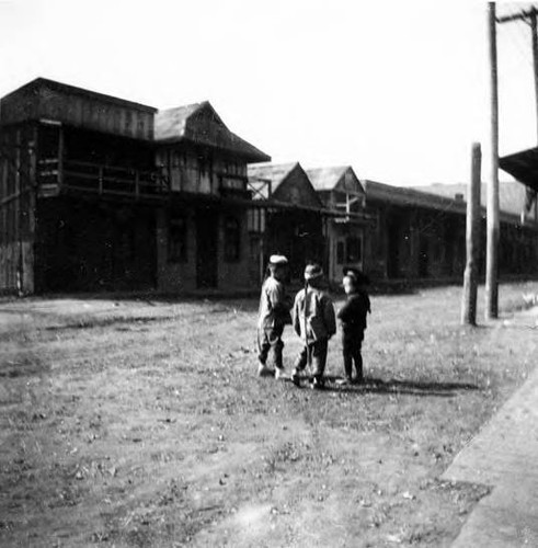 Marchessault Street looking towards Alameda with 3 Chinese boys