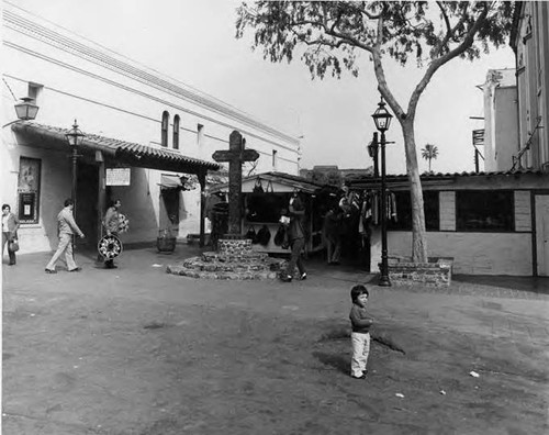 Olvera Street cross and stalls