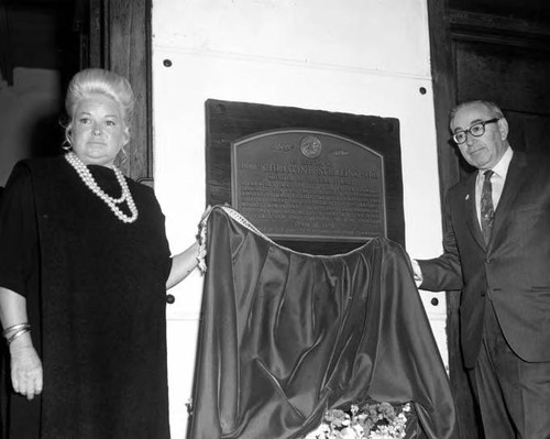 June Parks and another man unveiling the Christine Sterling plaque