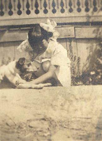 Eight year old Dorothy Siu with her dog Charlie