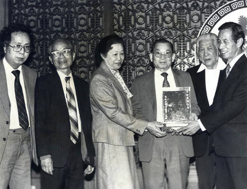 Poy Wong and his wife receive recognition from the Indo Chinese Affairs Committee