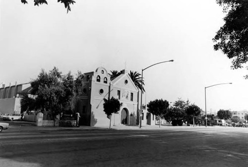 Plaza Catholic Church looking northwest. Campo Santo parking lot and Main Street are shown