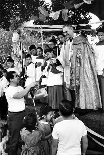 Blessing man with duck