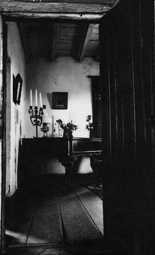 Piano with candleabra in the Avila Adobe