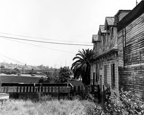 Side view of the Rochester house, looking toward the freeway