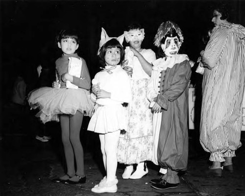 Children in costume for Mardi Gras at the old Plaza and Olvera Street, annually the night before Ash Wednesday