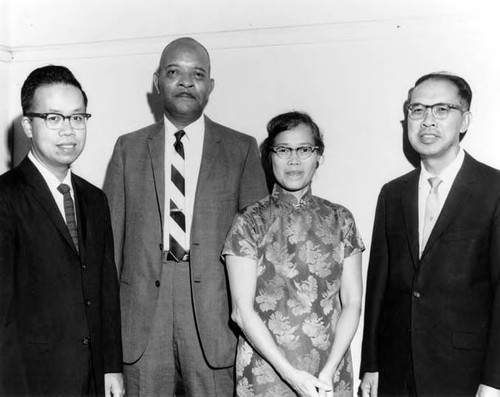 This photograph was taken at the ESL adult school at C.A.C.A. From left to right: Stanton Mu, ________, Moon B. Lee, Billy Lew