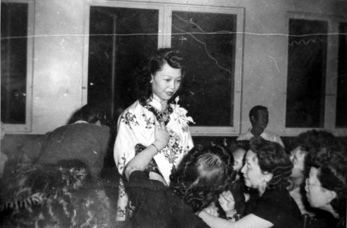 Bride, Mary Moy, Mama Quon's daughter, being admired