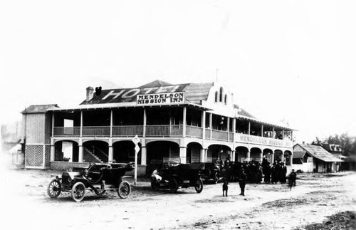 Mendelson Mission Inn with a 1911 Ford in front and behind it a 1913 Ford, hotel was remodeled in 1911- 1913