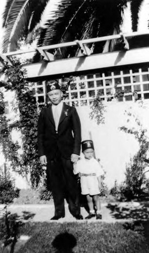 Peter Soo Hoo Jr. and his dad in Shriner's hats