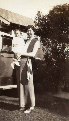 Dorothy Siu holding one year old Ronald Siu