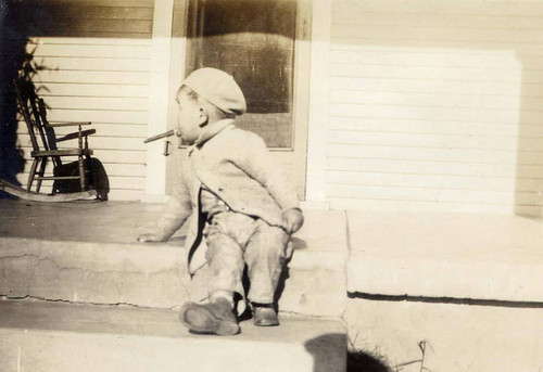 Roger sitting on the porch