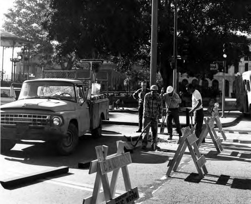 Workers closing Sunset Boulevard