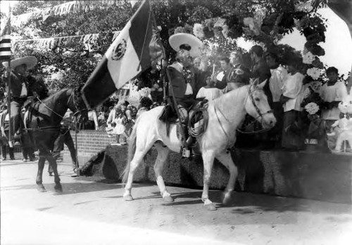 Crowds of people clebrating in the Plaza and on Olvera Street