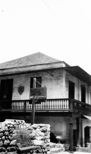 Olvera Street view of Pelanconi House, "Yellow Puppeteers"